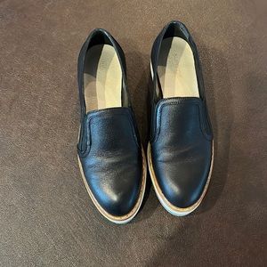 Size 37/7 summit black platform loafers. Never worn. New in box.
